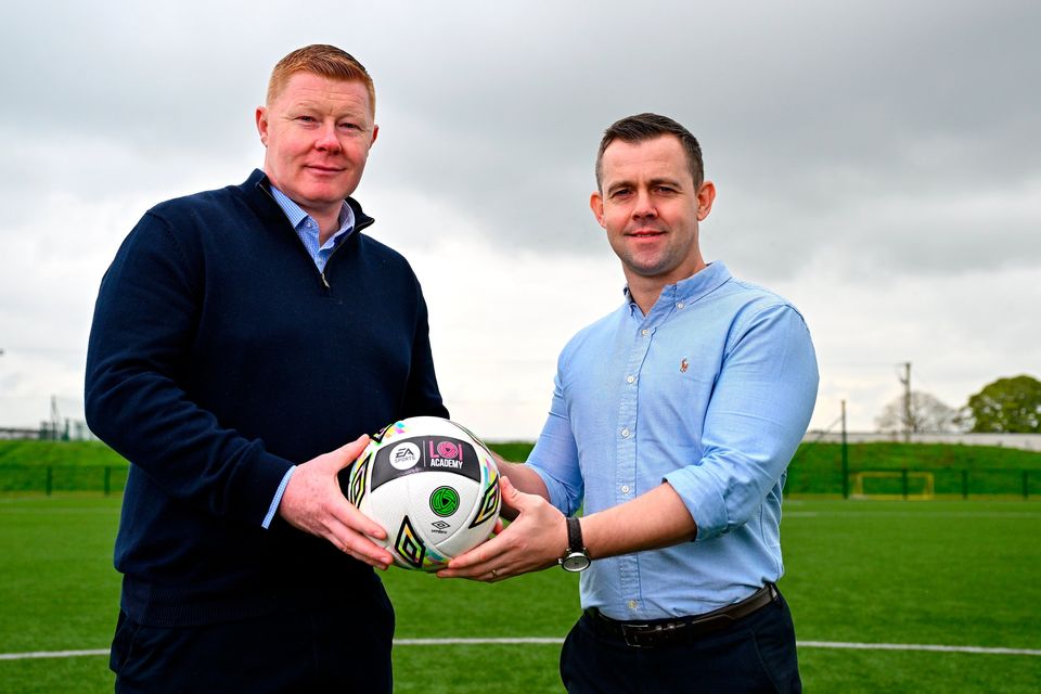 LOI Development Manager Will Clarke, left, and FAI assistant director of football Shane Robinson pose for a portrait after an EA Sports LOI Academy media briefing