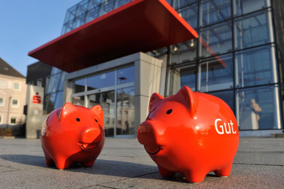 Sparkasse piggy banks outside one of the branches in Germany. The methods of the bank Sparkasse are winning over fans here, too — especially in the wake of the stories about people being left devastated by Irish banks over tracker mortgages. Photo: Stefan Kuhn