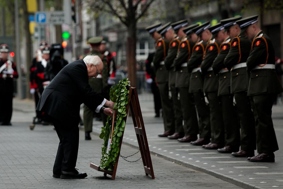 President Michael D. Higgins lays a wreath during 1916 commemorations at the GPO on O'Connell Street, Dublin, yesterday. Photo: Gareth Chaney/Collins Photos