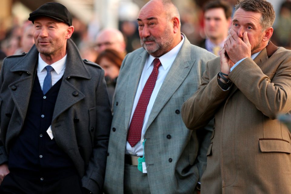 Lee Westwood (right), Alan Shearer and Chubby Chandler at Cheltenham yesterday (PA)