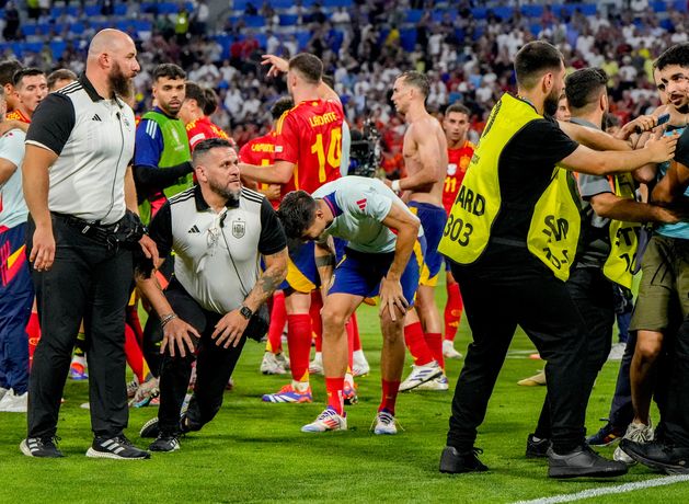 Watch: Spain captain Alvaro Morata suffers freak injury following post-match pitch invasion