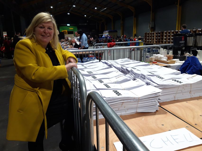 Dubln Bay North poll topper Sinn Fein's Denise Mitchell with her accumulating piles (1,000 in each) of votes