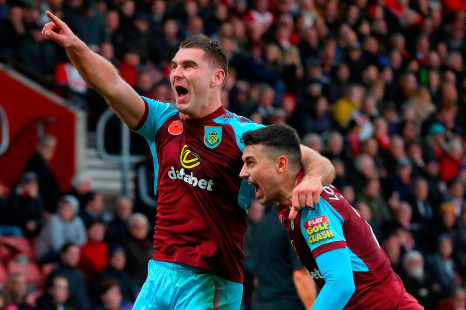 Burnley's Sam Vokes celebrates scoring his sides first goal of the game with Burnley's Matthew Lowton during the Premier League match at St Mary's Stadium, Southampton. Adam Davy/PA Wire.