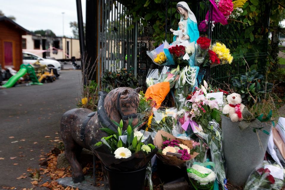 Floral tributes at the scene of the tragic fire at Glenmaluck Road, Carrickmines yesterday. Photo: Tony Gavin. 
Photo: Tony Gavin 10/10/2015