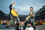 thumbnail: Adam Clayton and The Edge perform on stage for the second night of U2's 360 Degrees World Tour in their home town at Croke Park on July 25, 2009 in Dublin, Ireland.