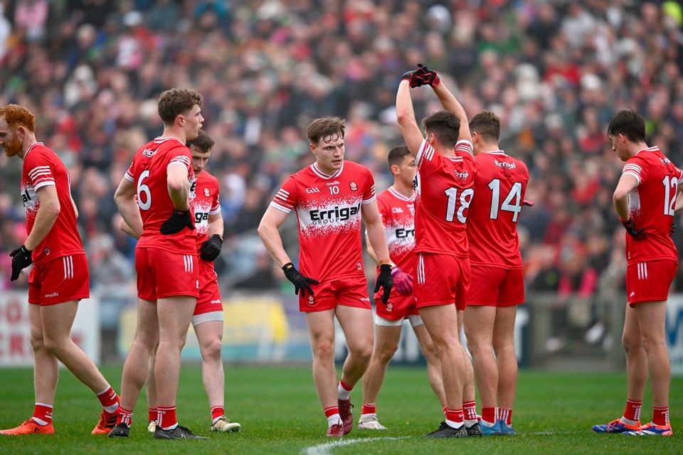 Derry players look dejected against Mayo