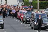 thumbnail: The funeral cortege makes its way to the cemetary at the funeral of Angela Kelly who was one of three people killed in a car crash last Sunday at Middlemount on the R433 Rathdowney to Abbeyleix Road