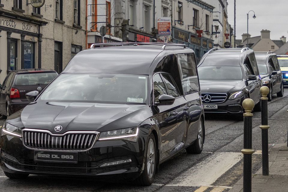 The hearses carrying the bodies of the Bowden family en route to Donegal on Monday. Photo: Joe Boland.