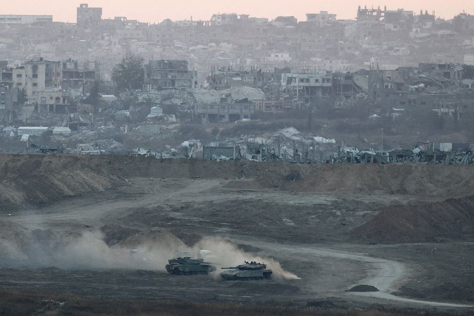 Israeli tanks operate in Gaza by the Israel-Gaza border, as seen from Israel on Saturday, May 3. Photo: Amir Cohen/Reuters