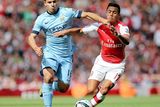 thumbnail: Manchester City's Sergio Aguero (left) is challenged by Arsenal's Alexis Sanchez