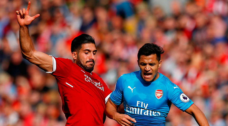 Arsenal's Alexis Sanchez in action with Liverpool's Emre Can. Photo: Phil Noble/Reuters