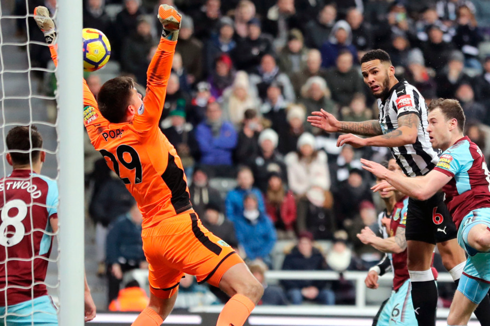 Newcastle United’s Jamaal Lascelles scores his side’s only goal of the game during the Premier League clash with Burnley at St James’ Park last night