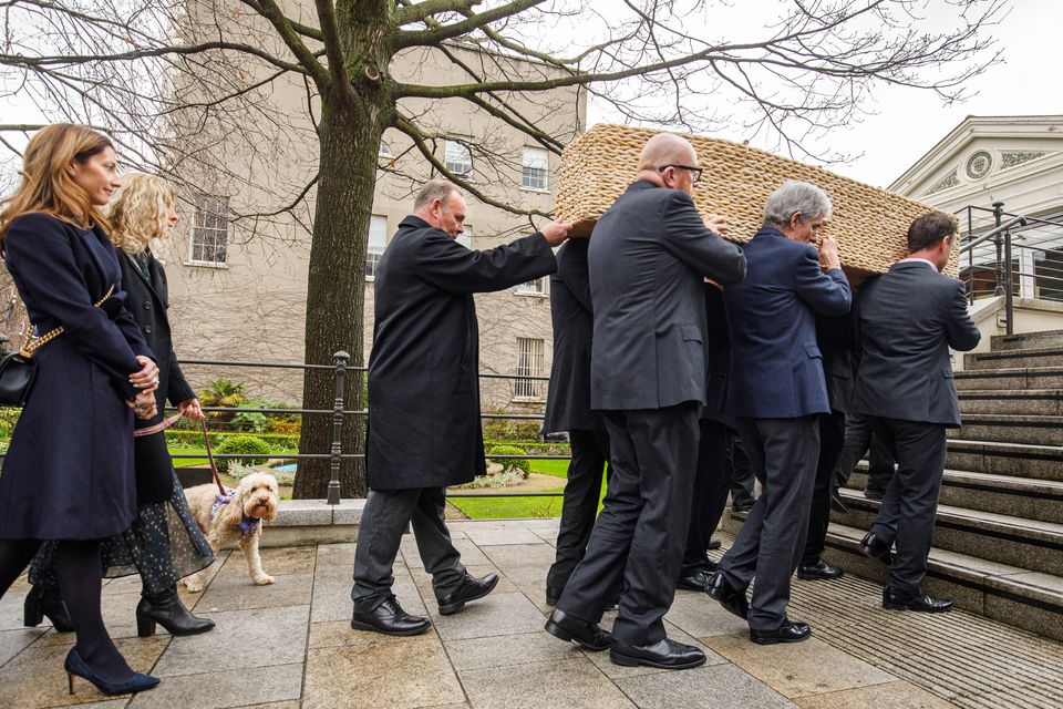 Charlie Bird's wife Claire Mould and their dog Tiger arriving for his memorial service at the Mansion House, Dublin. Photo: Mark Condren