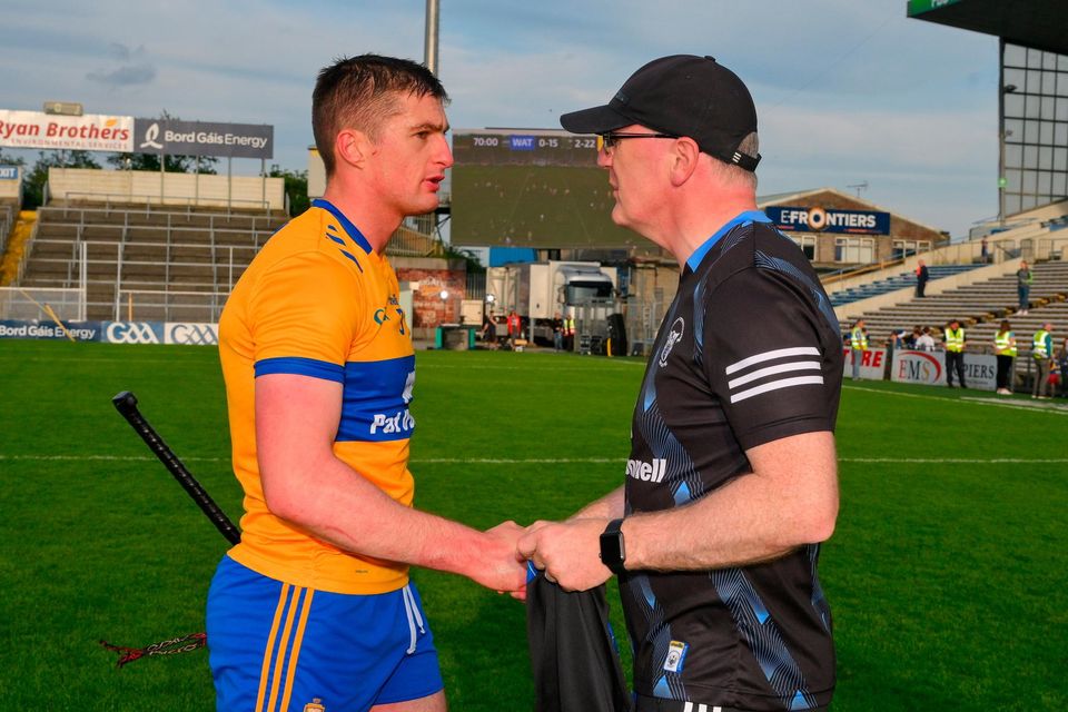 Clare manager Brian Lohan congratulates Conor Cleary, who suffered a dislocated shoulder two and a half weeks ago. Photo: Sportsfile