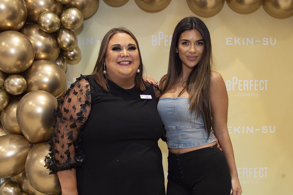 Store manager Lisa Power pictured with Love Island's Ekin Su at Hickey's Pharmacy in Gorey at a recent store event. Pic: Jim Campbell