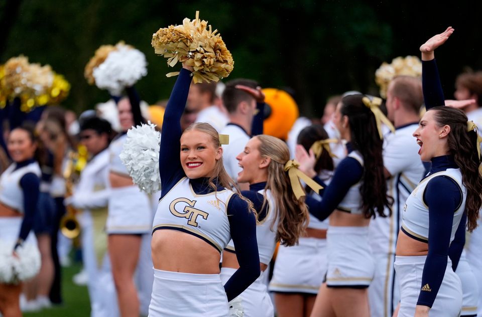 Georgia Tech cheerleaders performing at the Georgia Tech Helluva Block Party Pep Rally in Merrion Square, Dublin, as part of the build up to Saturday’s Aer Lingus College Football Classic, US College football match in Dublin. Photo: Brian Lawless/PA Wire