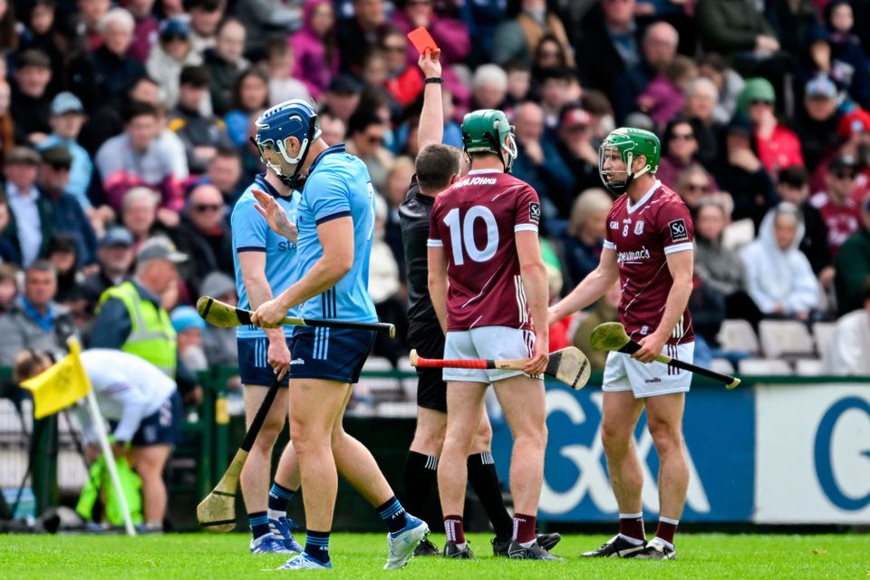 Referee Colm Lyons shows a red card to Galway's David Burke during their Leinster SHC Round 5 match at the Pearse Stadium in Galway.  Photo: Daire Brennan/Sportsfile