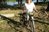 thumbnail: On your velo: Madeleine Keane takes a breather during her 14-kilometre cycle on La Voie Bleue along the river Saone.