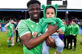 thumbnail: Ollie Hamzat of Glebe North celebrates with daughter Safiya, aged 18 months, after the final whistle. Photo by Ben McShane/Sportsfile 