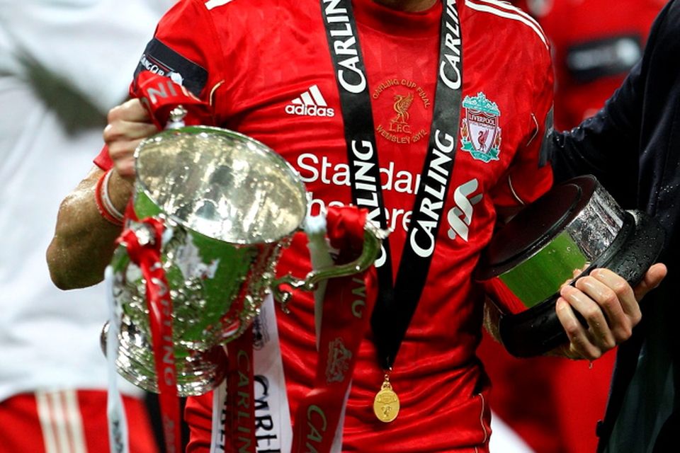 File photo dated 26-02-2012 of Liverpool's captain Steven Gerrard with the Carling Cup trophy. 
Nick Potts/PA Wire.