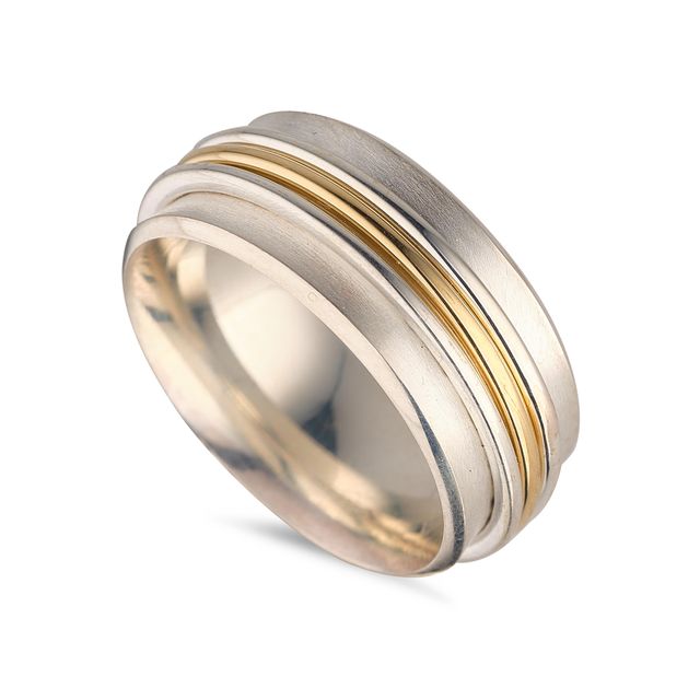 Spinning ring in silver and 18ct gold, €850, Stonechat, Westbury Mall, D2, or see stonechatjewellers.ie