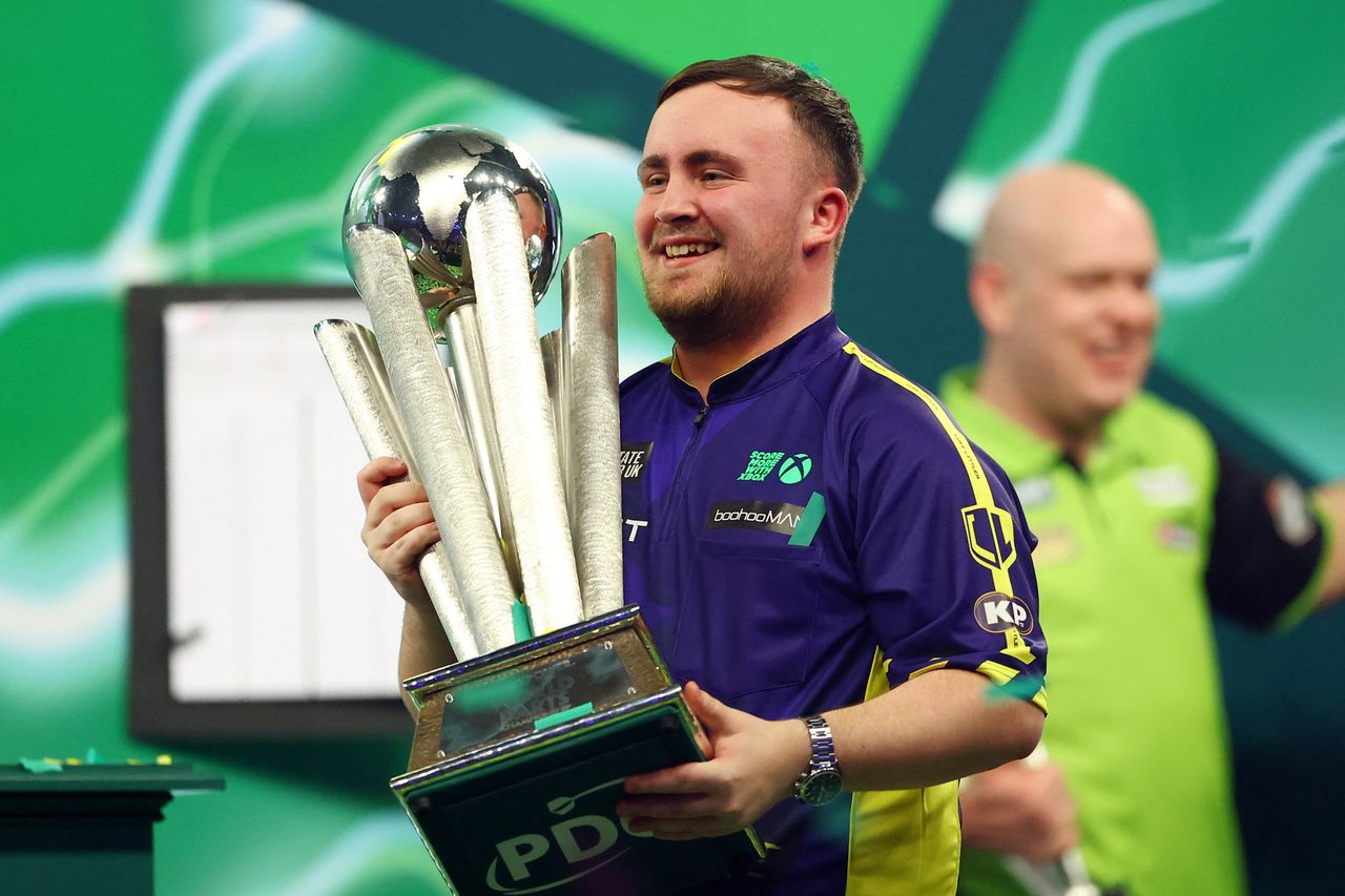 Teenage sensation Luke Littler emphatically sees off Michael van Gerwen to win World
