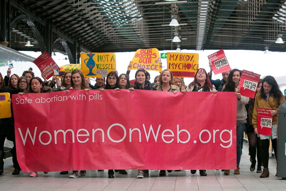 Pro Choice activists after arriving from Belfast after bringing back abortion pills denied to women in the Republic of Ireland at Connolly Station, Dublin. Photo: Gareth Chaney Collins