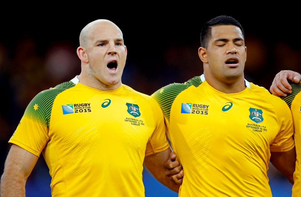 Rugby Union - Australia v Fiji - IRB Rugby World Cup 2015 Pool A - Millennium Stadium, Cardiff, Wales - 23/9/15
Australia's Stephen Moore and Scott Sio line up for the national anthems before the game
Action Images via Reuters / Paul Childs
Livepic