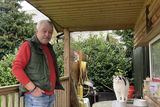 thumbnail: Sean lives in his log cabin with his cat Oscar and two dogs Lady and Jess