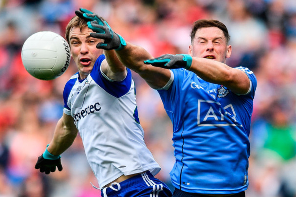 Jack McCarron of Monaghan in action against Philly McMahon of Dublin