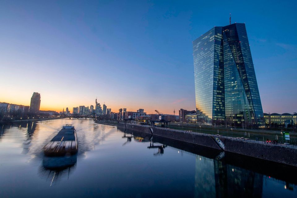 A barge makes its way on the river Main past the headquarters of the European Central Bank