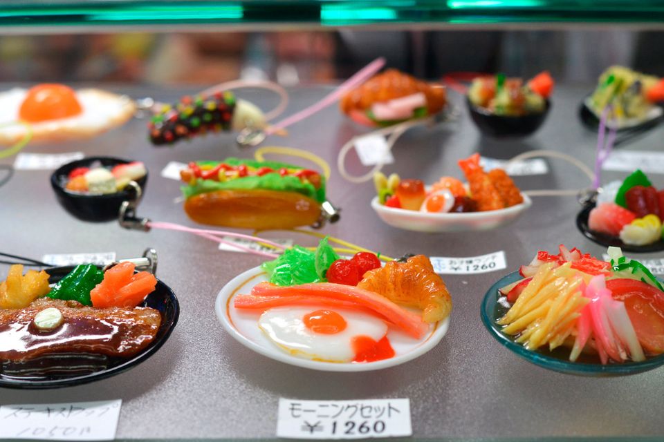 Phone trinkets in Osaka. Plastic food is common in restaurant windows, and miniature versions are sold as keepsakes to attach to smartphones.