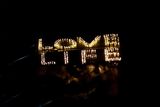 thumbnail: A Love Life sign on display during a previous Darkness Into Light walk in Inistioge, Co Kilkenny.