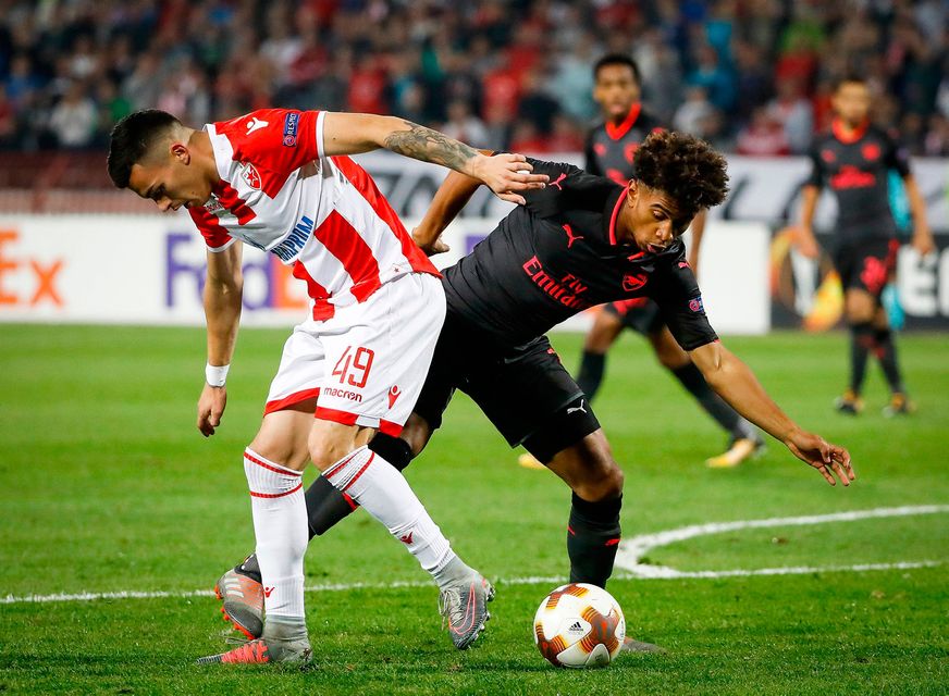 Arsenal's Reiss Nelson (R) in action against Nemanja Radonjic. Photo: Srdjan Stevanovic/Getty Images
