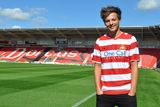 thumbnail: Louis Tomlinson is reported to be involved in a joint bid to buy his hometown football club Doncaster Rovers