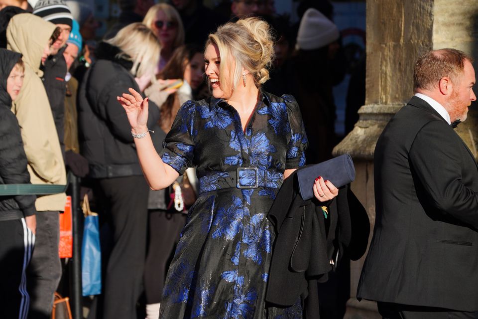 Sara Davies arrives for the wedding of Adam Peaty and Holly Ramsay (Ben Birchall/PA)