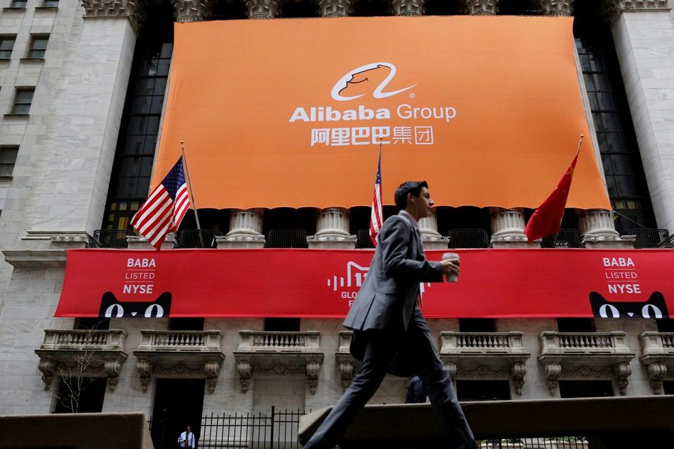 Signage for Alibaba Group Holding Ltd. covers the front facade of the New York Stock Exchange. Photo: Reuters