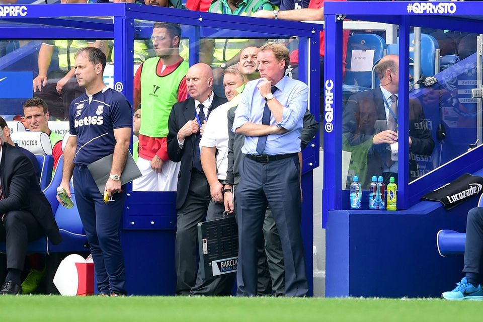 Harry Redknapp, centre, watched QPR fight back to draw 2-2 against Stoke