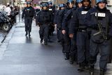 thumbnail: French riot police patrol in central Paris as part of the highest level of "Vigipirate" security plan after a shooting at the Paris offices of Charlie Hebdo January 9, 2015