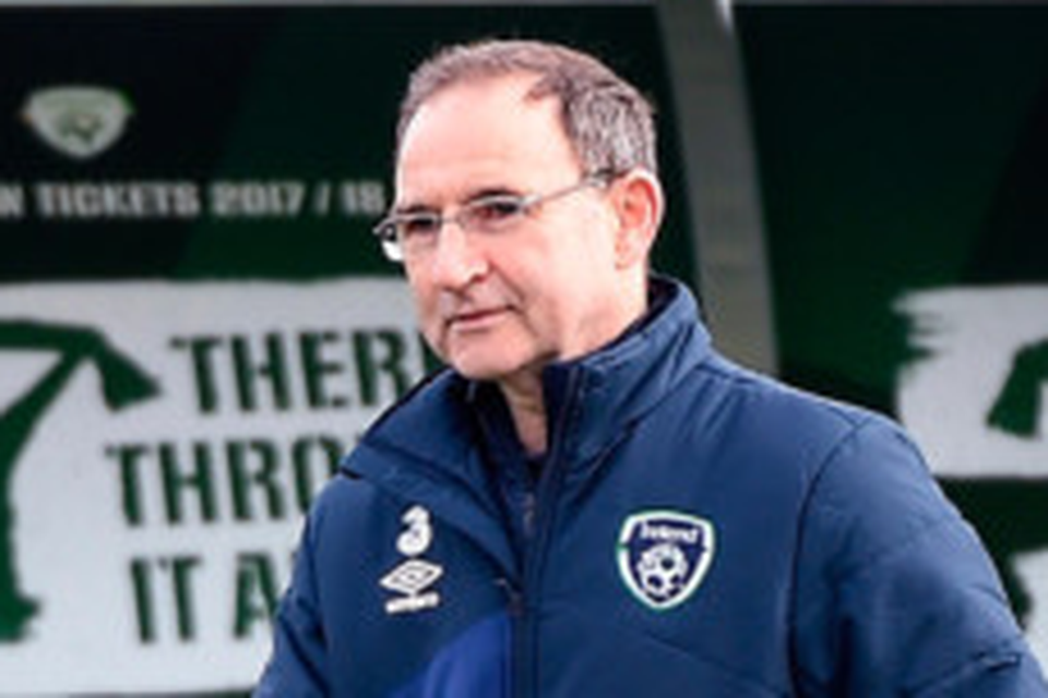A happy-looking Martin O’Neill greets members of his squad at Abbotstown. Photo: David Maher/Sportsfile