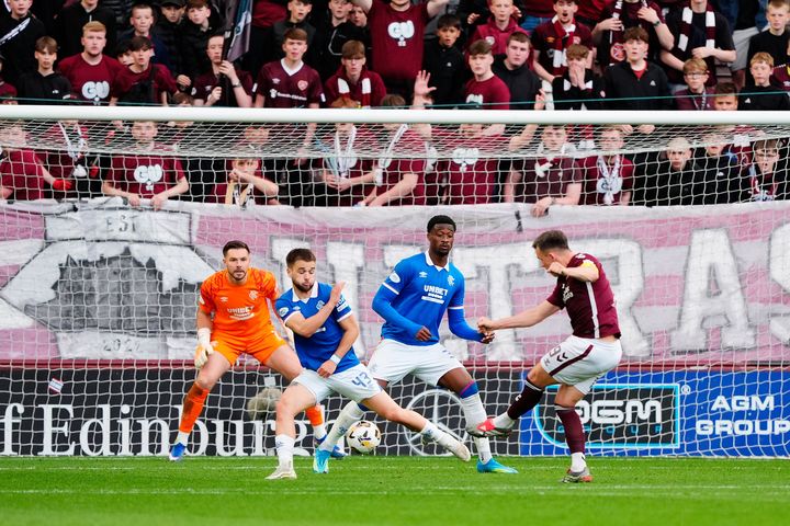 Hearts boost title hopes as victory over Rangers moves them three points clear of Celtic
