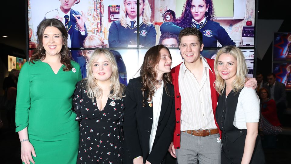 Writer Lisa McGee with the Derry Girls cast members (Niall Carson/PA)