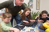 thumbnail: Graham Clifford monitoring his children's internet access, Aodhain (3), Aoife (6) and Molly (8)