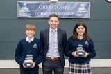 thumbnail: Buaic Chloch Students of the Year (1st year) Jack Deegan and Alannah Pappas, with year head Mr Aaron Creavin.