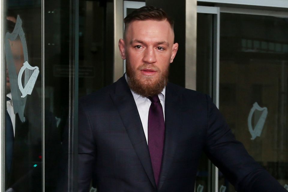 Conor McGregor leaves Dublin District Court after the case was struck out