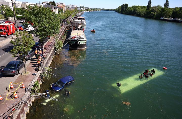 Trainee driver crashes bus containing passengers into River Seine near Paris