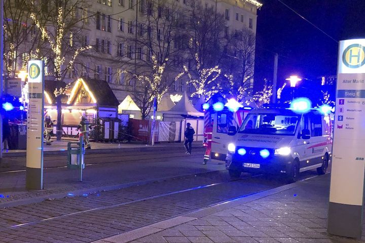 At least two dead and more than 60 injured after car driven into group of people at German Christmas market