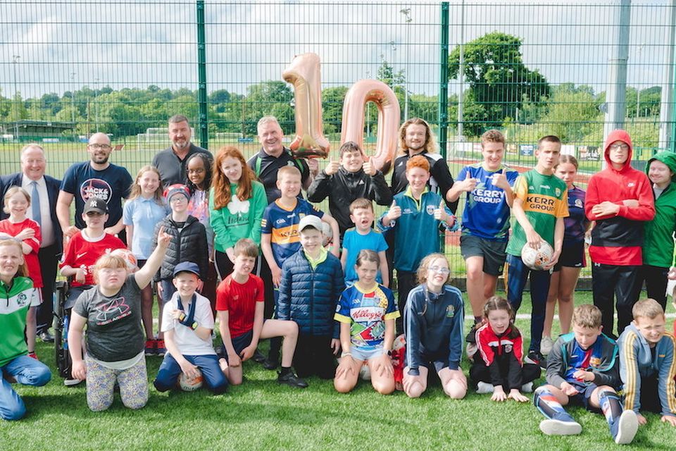 Members of Killarney Celtic FC pictured celebrating the Football for All project's 10th birthday.