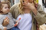 thumbnail: Sienna Miller out carrying her daughter Marlowe