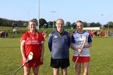 thumbnail: Glenealy captain Laura Manley, referee Con O Ceadaigh and Aughrim captain Aoife Campbell.